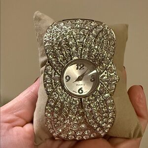 Elegant silver bangle style watch.
